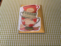 Warm and Cozy Stacked Teacups Greeting Card
